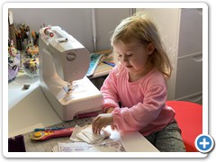 Never too young to start training future  Quilting Collective members.