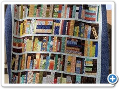 Bookcase quilt made as a gift. Quilted by Quilting Matilda